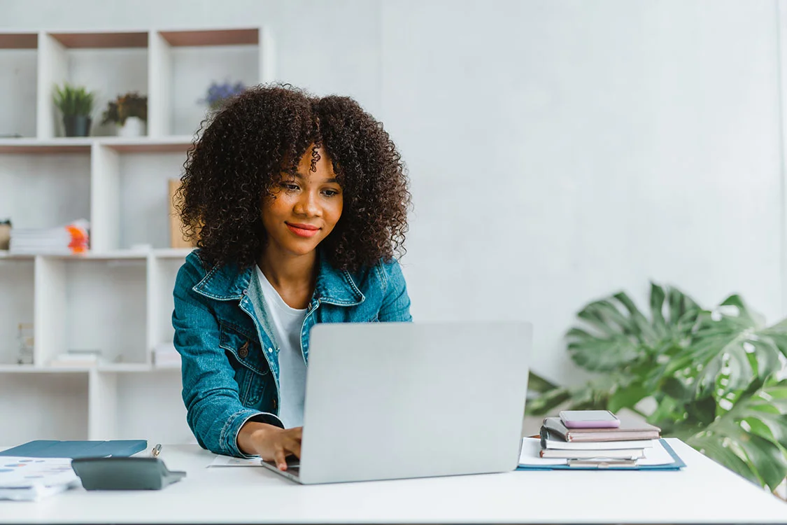 Woman using laptop computer